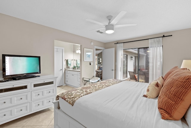 bedroom featuring access to exterior, light tile patterned floors, ensuite bath, and ceiling fan