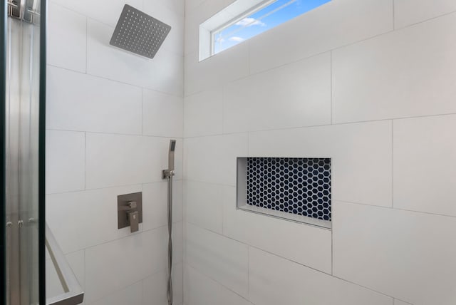 bathroom with a shower