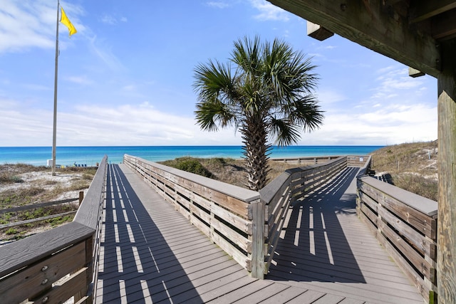 view of home's community featuring a view of the beach and a water view