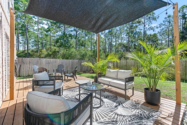 wooden deck with an outdoor living space