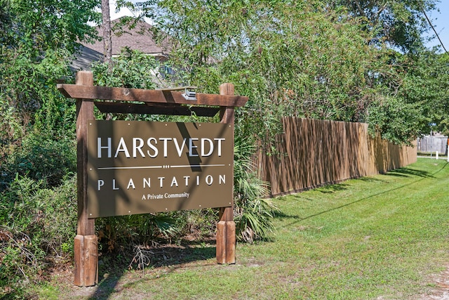 community sign with a lawn