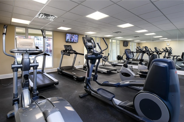 workout area with a paneled ceiling