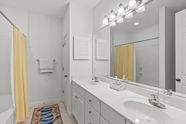 bathroom featuring vanity, shower / tub combo with curtain, and tile patterned floors