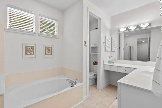 full bathroom featuring toilet, shower with separate bathtub, vanity, and tile patterned flooring