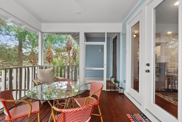 sunroom / solarium featuring plenty of natural light