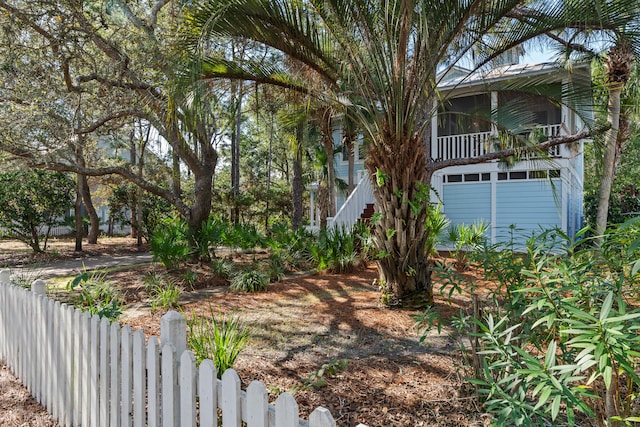 view of yard featuring a balcony