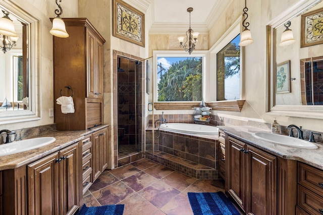 bathroom featuring vanity, independent shower and bath, and ornamental molding