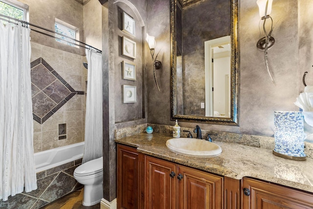 full bathroom with vanity, shower / bathtub combination with curtain, and toilet