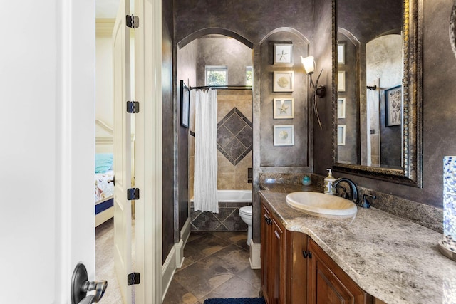 full bathroom featuring vanity, toilet, and shower / bathtub combination with curtain