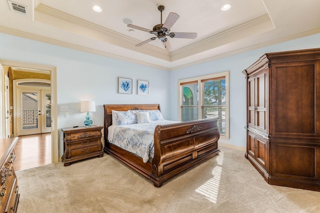 bedroom featuring access to outside, a raised ceiling, light carpet, ceiling fan, and crown molding