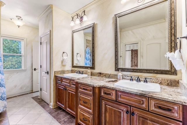 bathroom with vanity, ornamental molding, and tile patterned floors