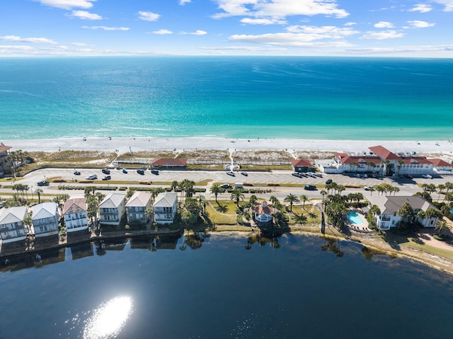 aerial view featuring a water view and a view of the beach