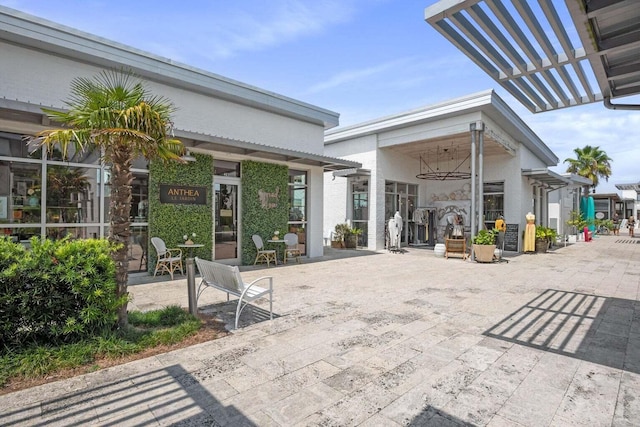 view of patio featuring a pergola