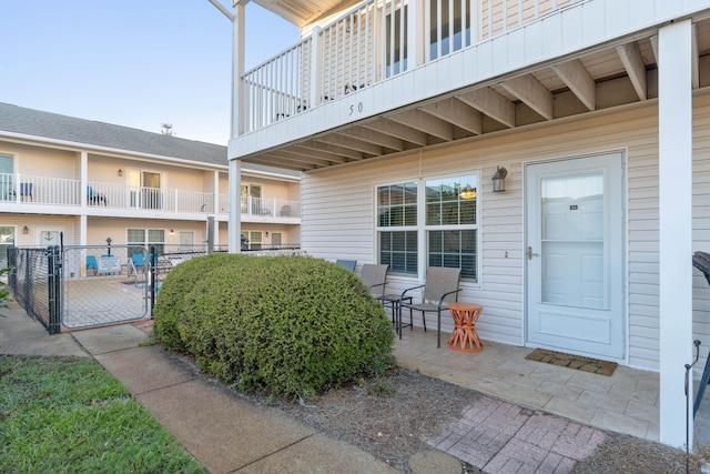 exterior space with a balcony and a patio