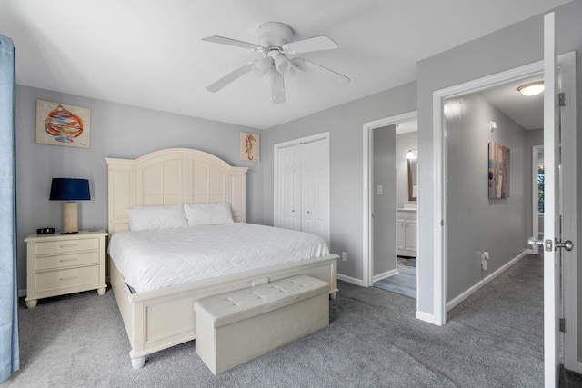 carpeted bedroom with a closet and ceiling fan