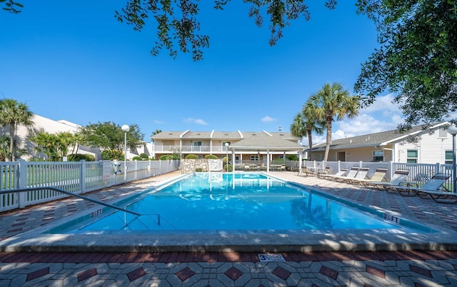 view of pool featuring a patio area