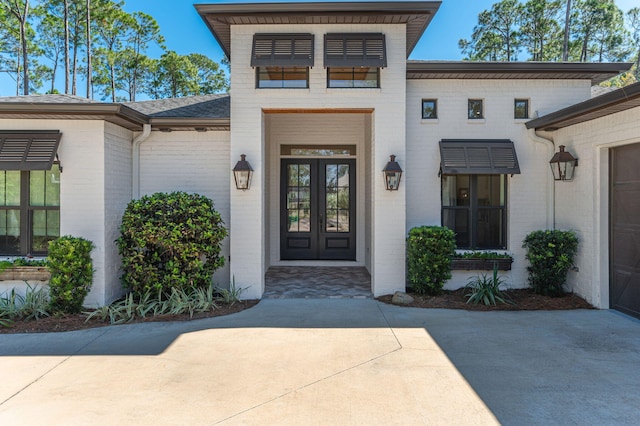 entrance to property featuring french doors