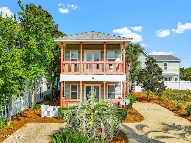 view of property featuring a porch