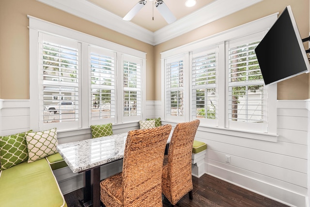 dining room featuring crown molding, dark hardwood / wood-style floors, a healthy amount of sunlight, and breakfast area