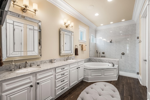 bathroom with vanity, separate shower and tub, crown molding, and hardwood / wood-style flooring