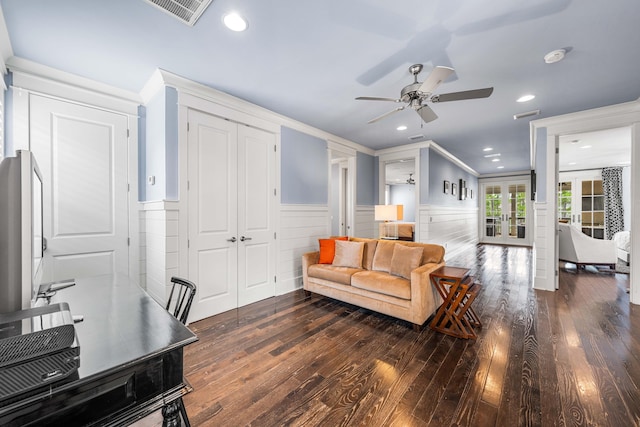 living room with french doors, crown molding, dark hardwood / wood-style flooring, and ceiling fan