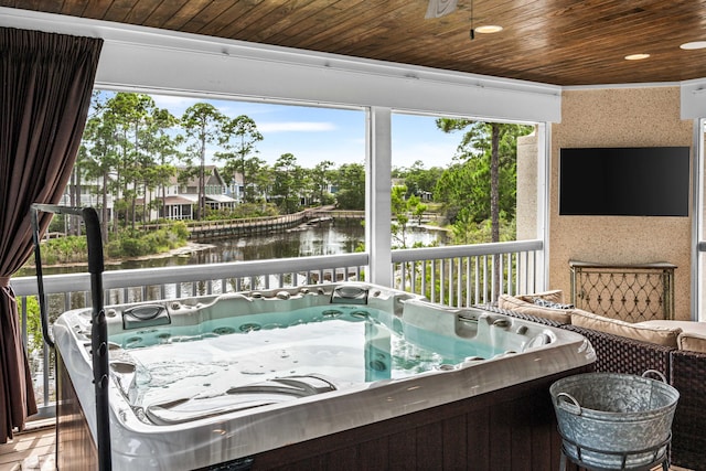 sunroom / solarium featuring a hot tub and wooden ceiling