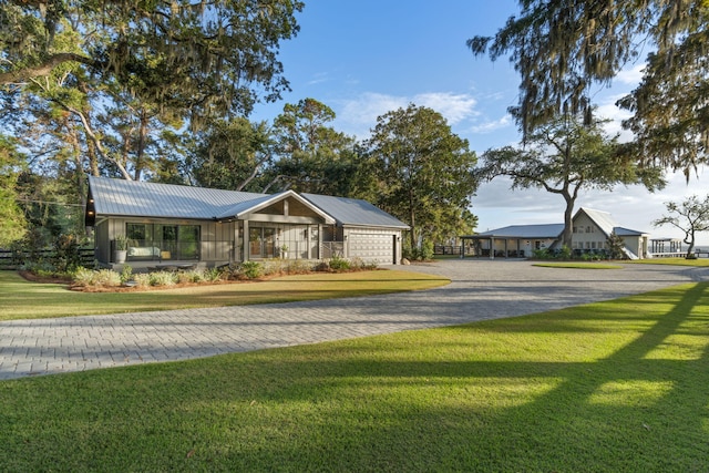 view of front of home featuring a front lawn and covered porch