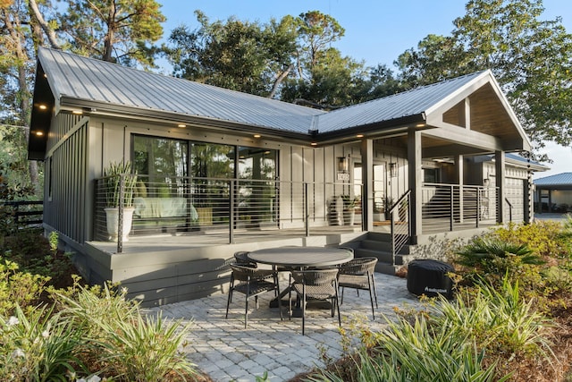rear view of house with a patio
