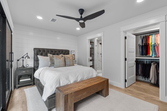 bedroom featuring a closet, ceiling fan, and light hardwood / wood-style floors