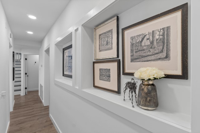 hall featuring wood-type flooring