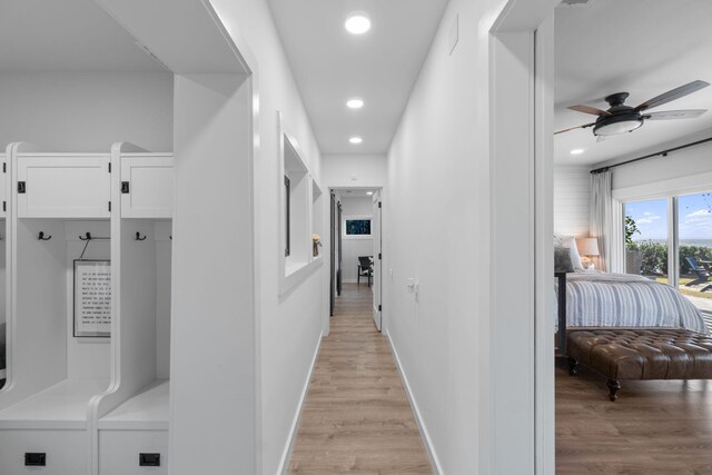 hallway featuring light wood-type flooring
