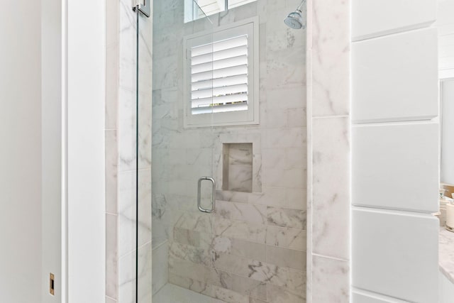 bathroom with walk in shower