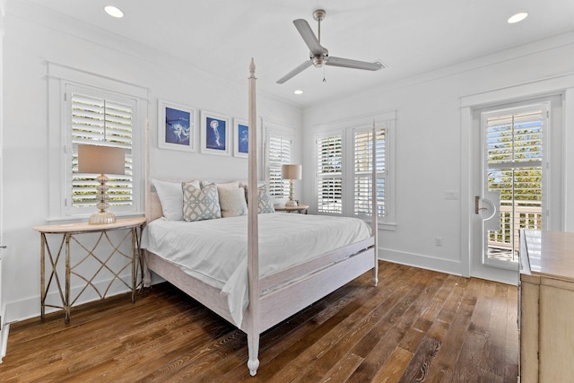 bedroom with access to outside, dark hardwood / wood-style floors, multiple windows, and ceiling fan