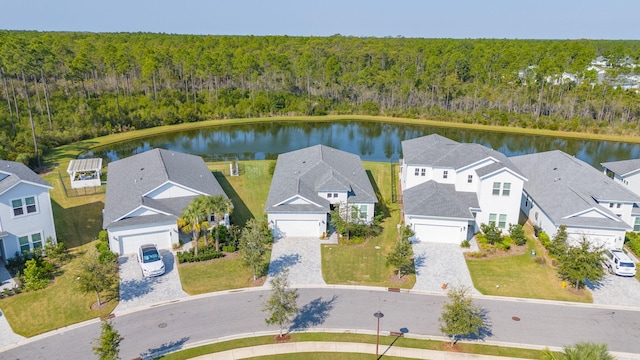 drone / aerial view with a water view