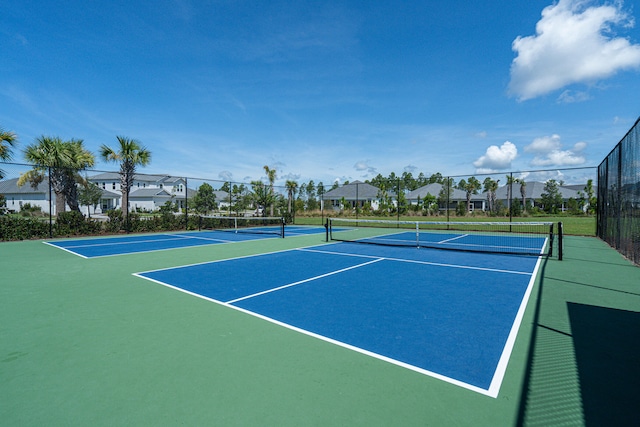 view of tennis court with basketball court