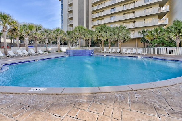 view of pool featuring pool water feature