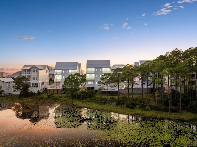 exterior space with a water view