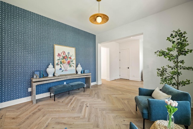 sitting room featuring light parquet floors