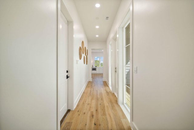 hall featuring light hardwood / wood-style floors