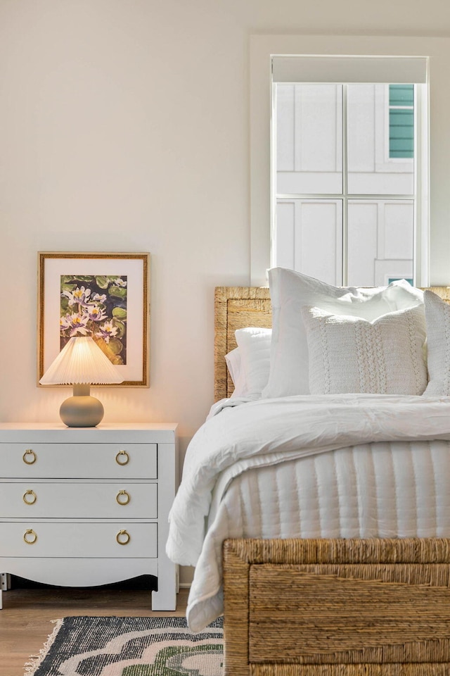 bedroom with hardwood / wood-style floors