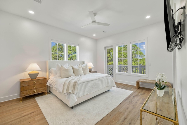 bedroom with light wood-type flooring and ceiling fan