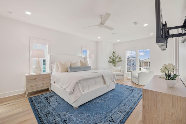 bedroom featuring light wood-type flooring and ceiling fan