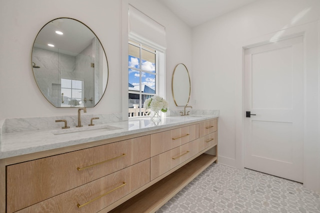 bathroom featuring vanity and walk in shower