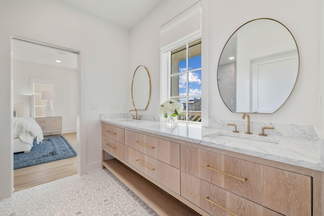 bathroom featuring vanity and hardwood / wood-style floors