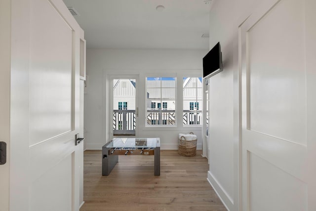 hall featuring light hardwood / wood-style floors