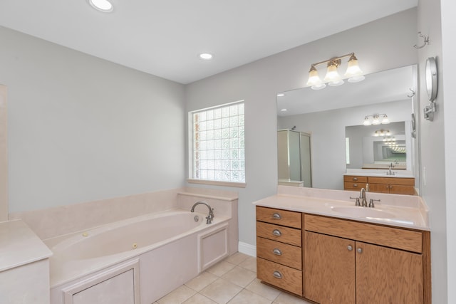 bathroom featuring tile patterned floors, vanity, and plus walk in shower