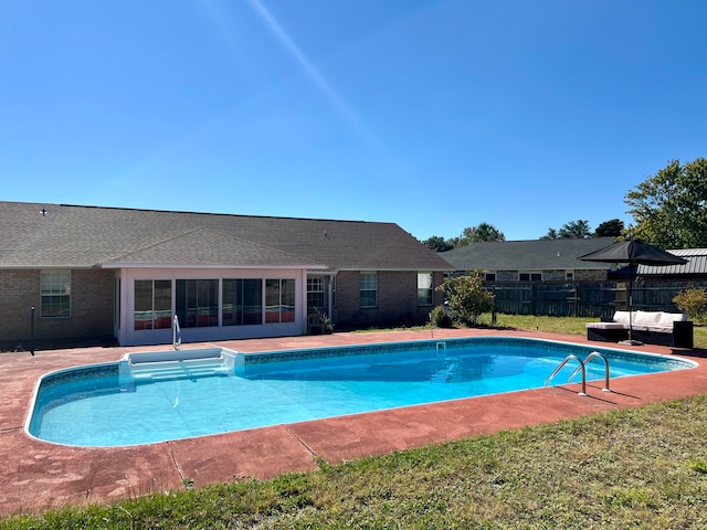 view of swimming pool with an outdoor hangout area and a patio area