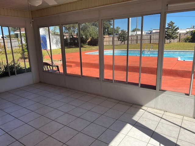 unfurnished sunroom with a healthy amount of sunlight