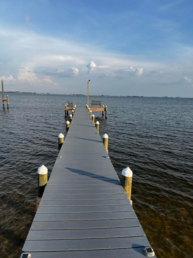 view of dock with a water view