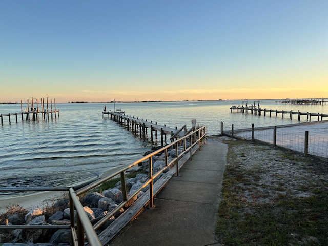 view of dock with a water view